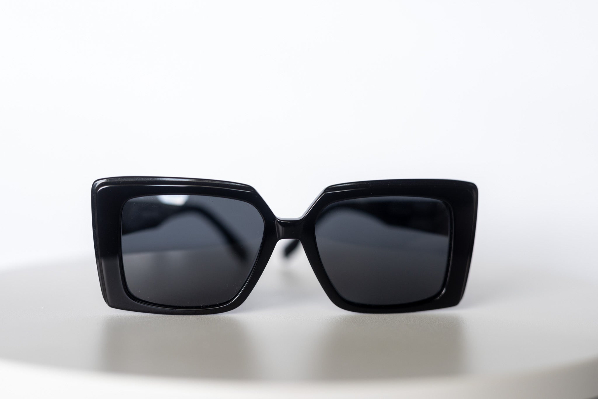 Unisex oversized square sunglasses in solid black acetate